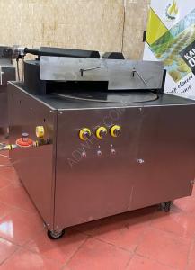 Rotary Arab Oven - It contains a circular disc with a ...