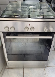 Gas with Siemens chrome oven, above and below, and a ...