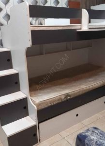 A bunk bed with mattresses, clean, Almost new At a price ...