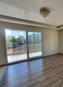 An empty apartment for sale in Mezitli area, menderes mahallesi It ...