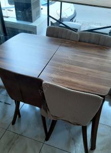Used dining table for sale with 6-chairs Very clean Price: 2000 tl Located ...