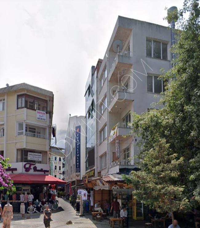 A building with three shops in the heart of Yalova city center that was used as a hotel is for sale