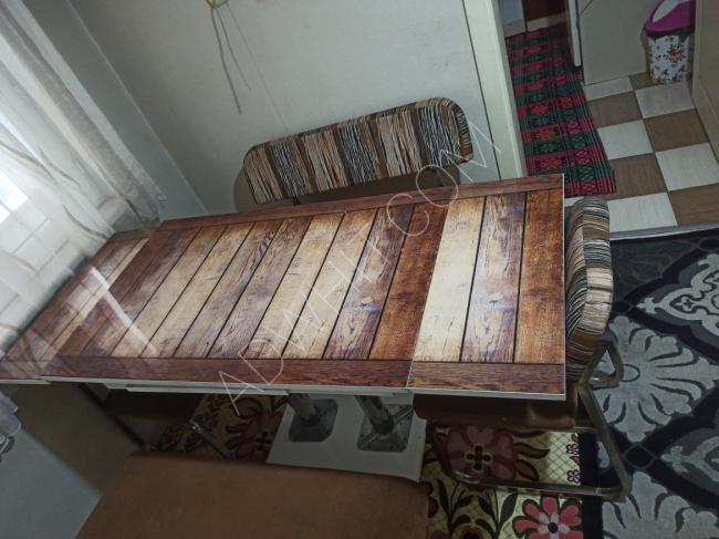 Dining table with its chairs