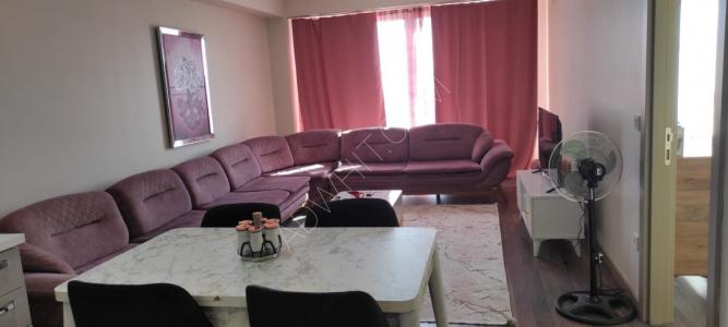 A two-bedroom apartment, 2 + 1 hall, with a large balcony, for annual rent, in Prime Suite, furnished