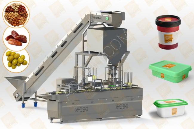 Solids filling machine (in plastic boxes)