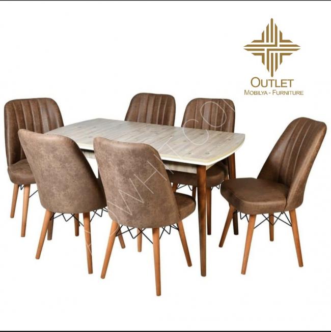 Extendable dining table with six chairs
