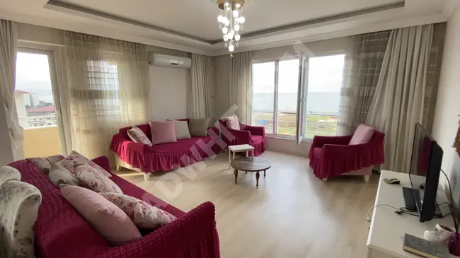 Arsin bölgesinin başında deniz ve doğaya full manzaralı full eşyalı bir daire