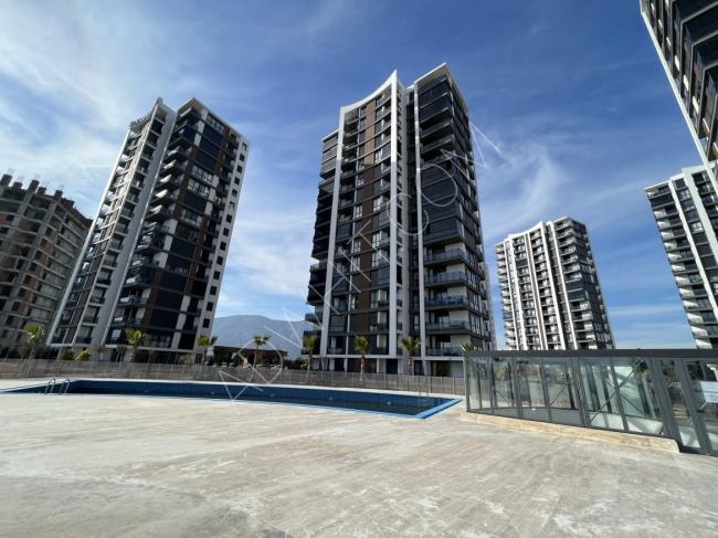 Apartment for sale in Antalya, with city views, in the Dosemealti area, which is suitable for real estate residency
