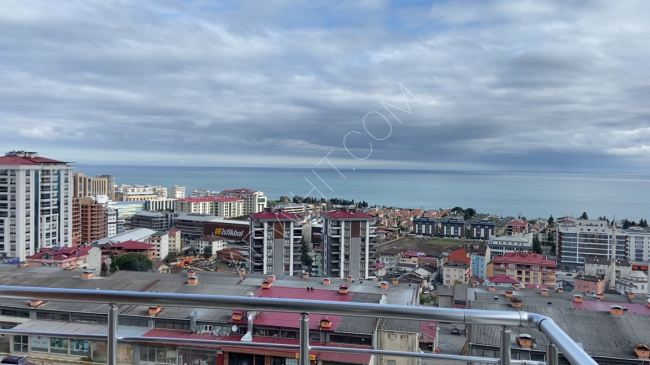 The opportunity to buy an inexpensive apartment with panoramic views of the sea and the city in Kasusto Trabzon