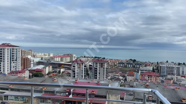 The opportunity to buy an inexpensive apartment with panoramic views of the sea and the city in Kasusto Trabzon