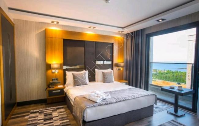 Trabzon'daki deniz kenarındaki otel konseptinde daireleri