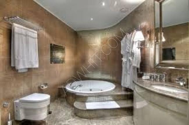 Bursa'da turizm amaçlı kiralık bir otel konseptinde daire, mineral su banyosu, yüzme havuzu ve restoran ile