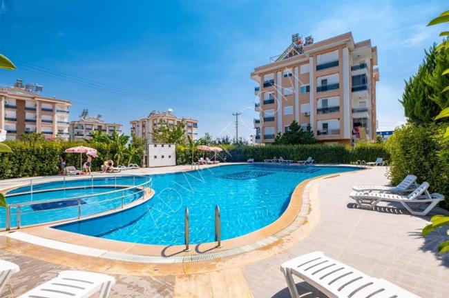 Apartment for sale in Antalya kepez within a complete complex and suitable for real estate residencey