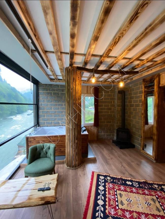 Trabzon Rize'deki nehre bakan kiralık bungalovlar