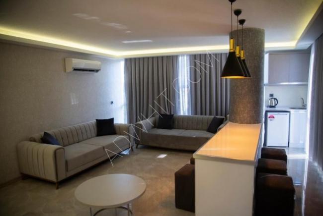 A hotel apartment in Bursa, close to the Marka Mall, for daily rent, three rooms and a hall