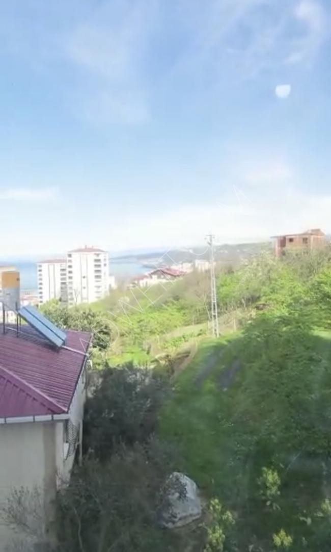 Two rooms, a hall, a kitchen, two bathrooms, and a balcony for tourist rent in Trabzon