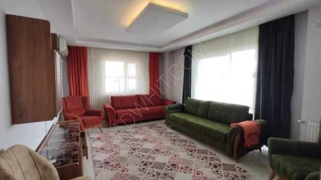 Furnished apartment for daily rent in the stock exchange, three rooms, a hall, a kitchen, two bathrooms and a balcony