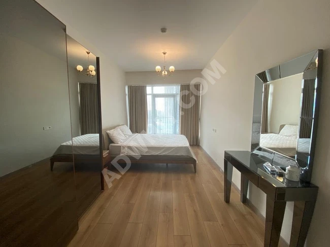 Three rooms, a hall, a kitchen, two bathrooms, and a terrace for tourist rent in Mall of Istanbul