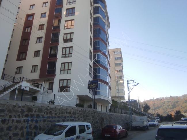Three-room apartment and a hall inside a residential complex in the center of Trabzon