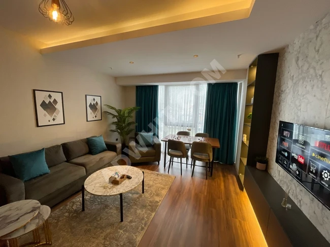 Hotel apartments for monthly tourist rent at 1450 dollars a month, including bills, a room and a hall near Mall of Istanbul and Medipol Hospital