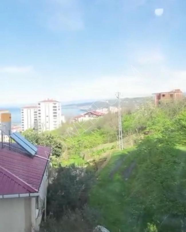 Hotel apartment in Trabzon, overlooking the sea and the nature, two rooms, a hall, a kitchen and two bathrooms