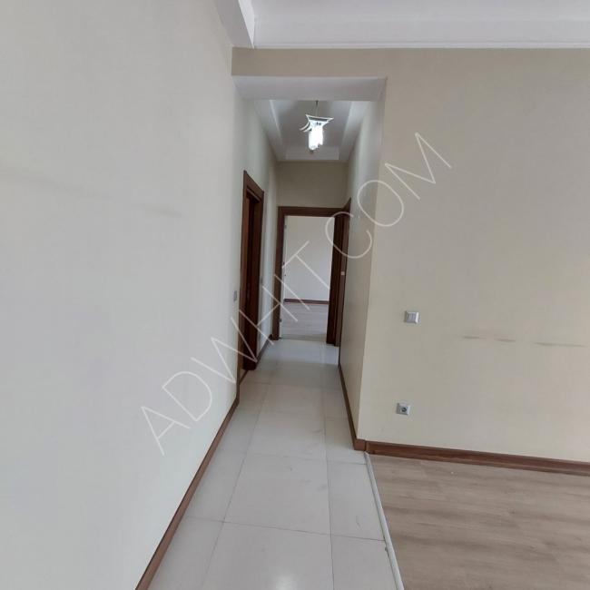 2+1 apartment for sale in BAHÇEKENT EMLAK KONUT complex, at a special price!