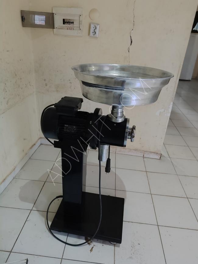 Electric grinder for grinding chickpeas, thyme, and others.
