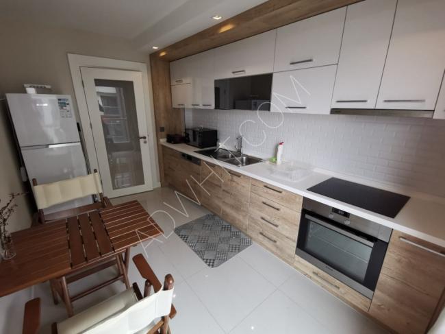 For sale, a new 2+1 apartment with furniture, adjacent to the famous Marmara Park Mall on the Metrobus line in Istanbul