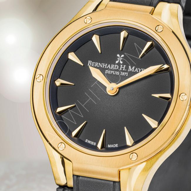 ساعة من شركة( برنارد اج ماير) السويسرية مطلية بالذهب الاصلية