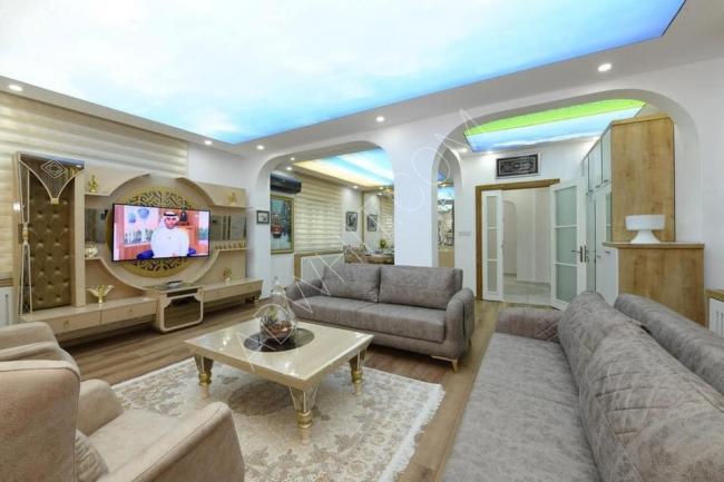 A furnished apartment with four rooms and a living room in Şişli