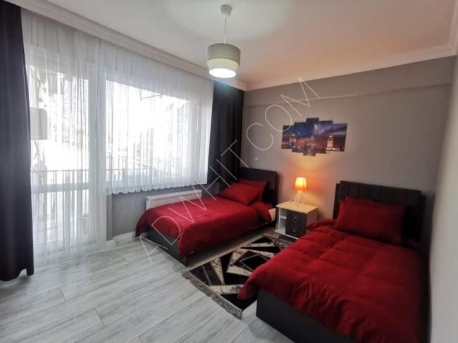 A furnished apartment with three rooms and a hall in Şişli Nişantaşı, Marka Street