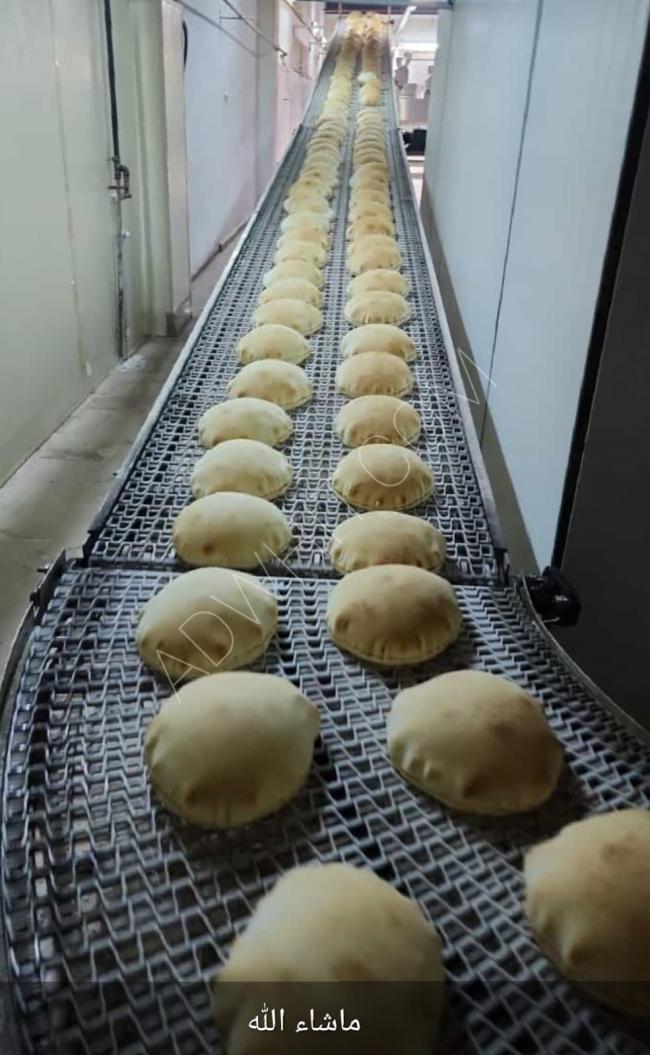 Arabic bread production line with dual cutting