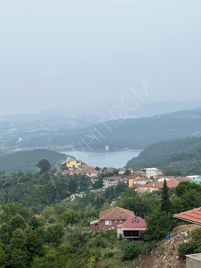 A furnished super deluxe apartment overlooking forests and Termal Lake, with access to sulfuric water, located within an investment and sale complex