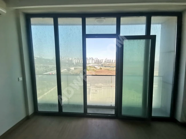 For sale, a new 2+1 apartment (zero) within the new residential complex Göl Panorama in Bahçeşehir area