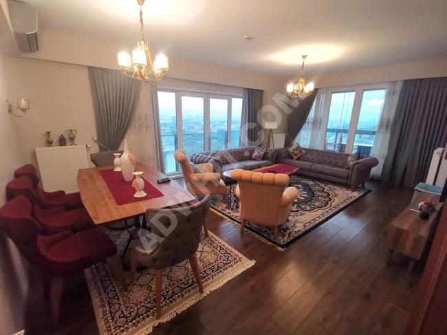 For sale, a luxurious and very spacious 4+1 furnished apartment with an unparalleled panoramic view from a high floor within the most luxurious complexes in Bashak Shehir