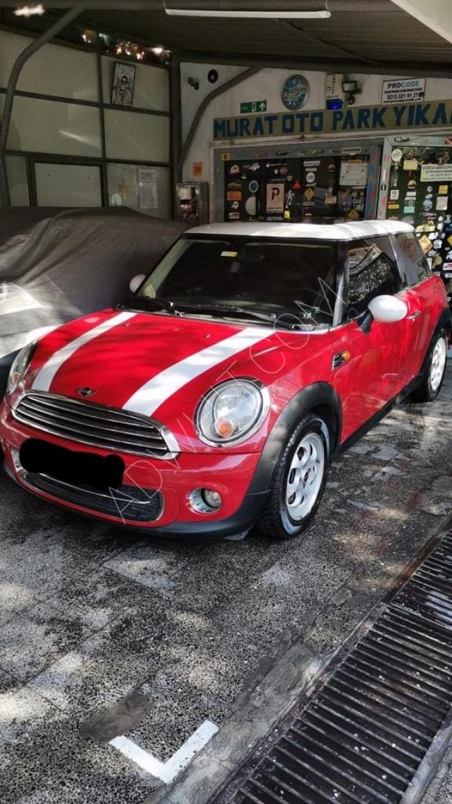 2012 Mini Cooper with a 1.6 petrol engine, clean, with a sunroof, original for sale