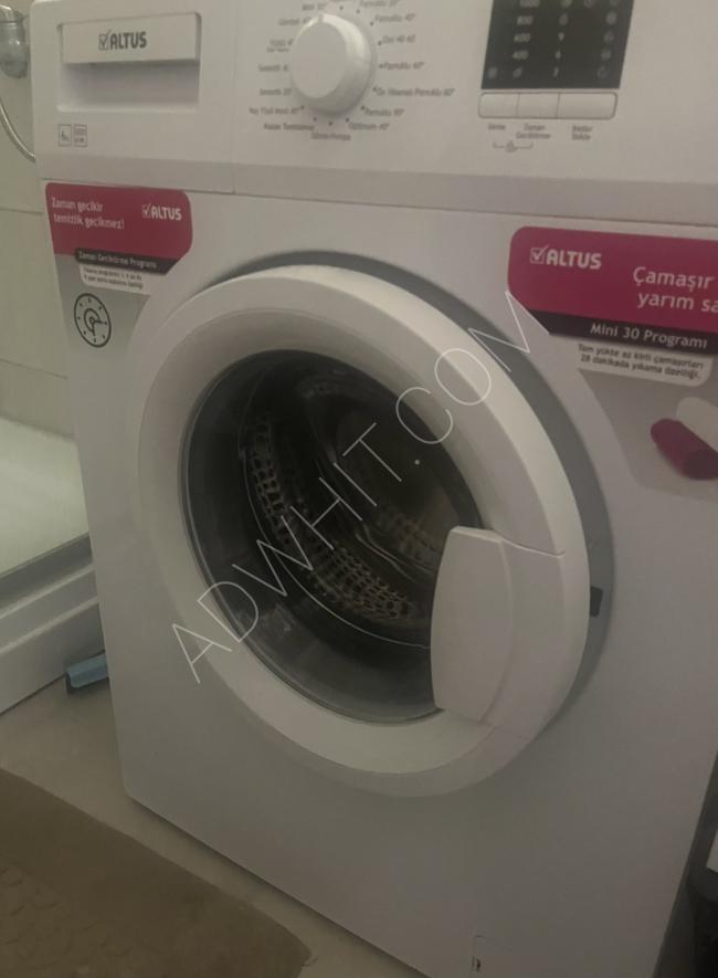 Mükemmel durumda olan Altus marka çamaşır makinesi