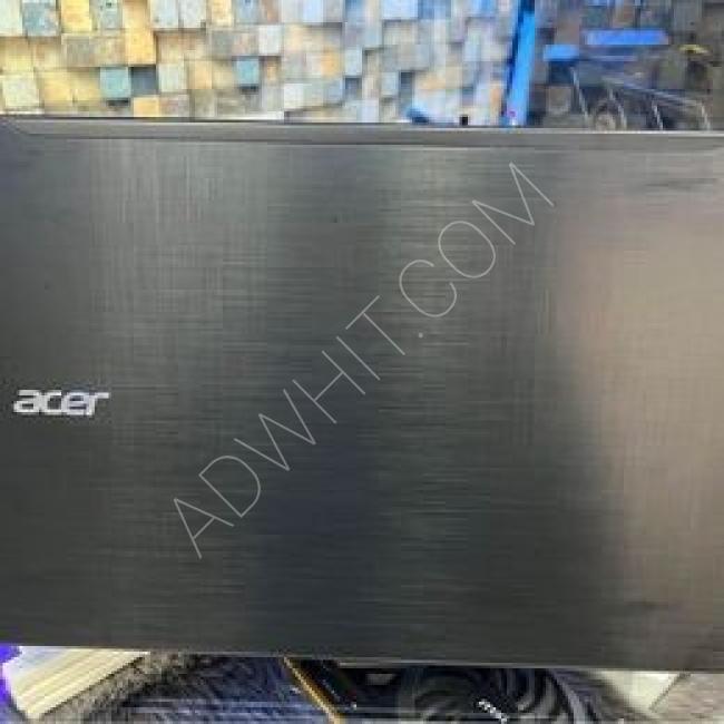 A used laptop from Acer with an excellent screen card and an electronic hard drive