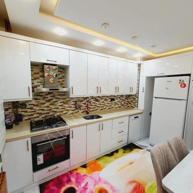 A hotel apartment for rent in Fatih, Istanbul, with four rooms and a hall