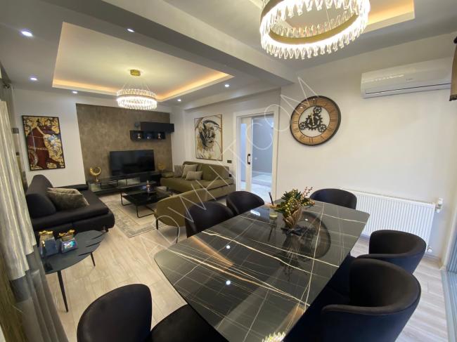 For sale, an apartment in Mersin in a prime location within a full-service complex