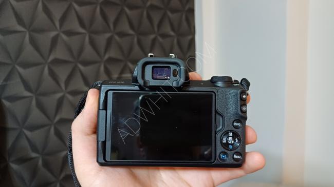 Canon M50 orijinal kutlu , yedek pilli ve hafıza kartlı bir kamera