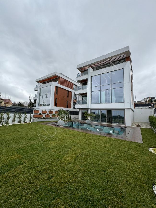 A new modern detached villa for sale in Kemerburgaz