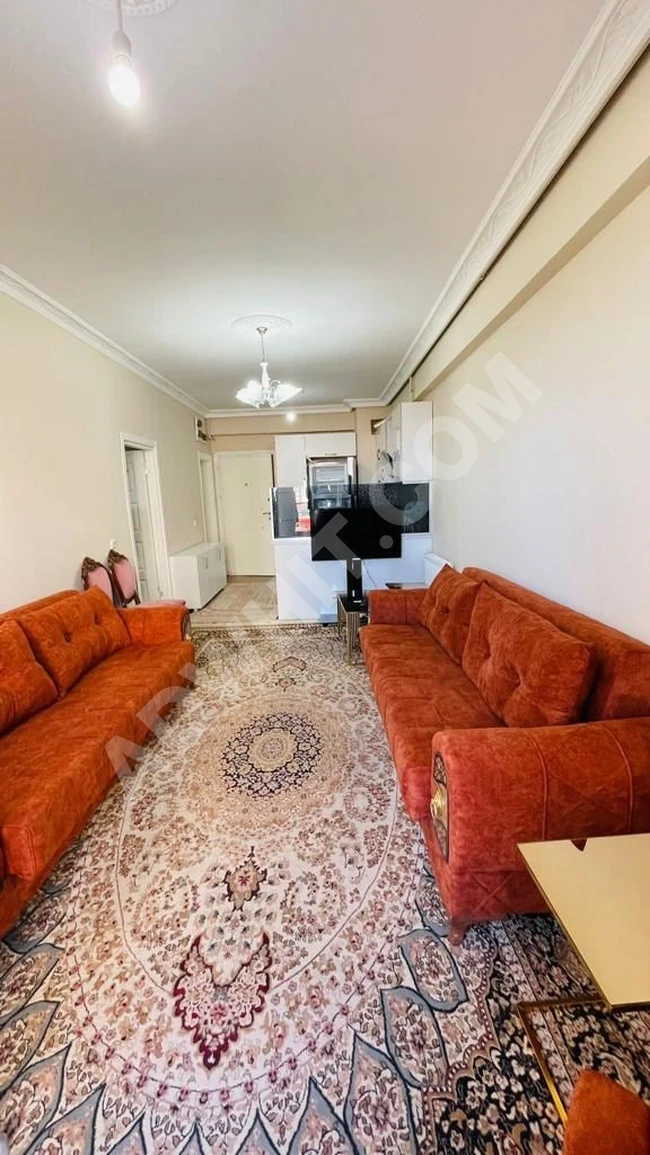 Annual rental apartment in Cumhuriat Mahallesi, one bedroom and a living room