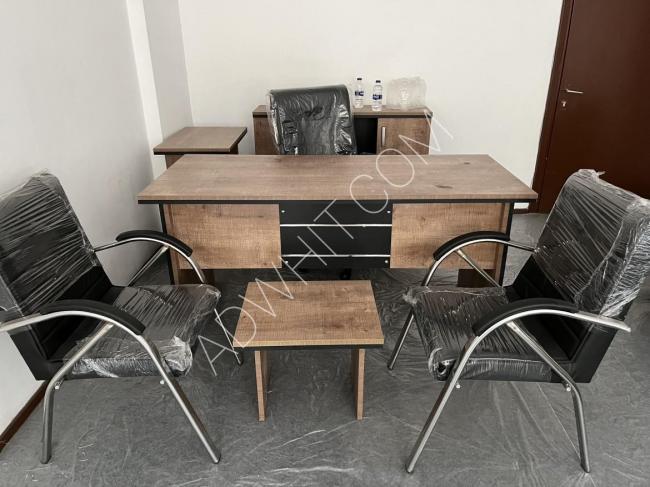 A desk table with 3 new chairs in total