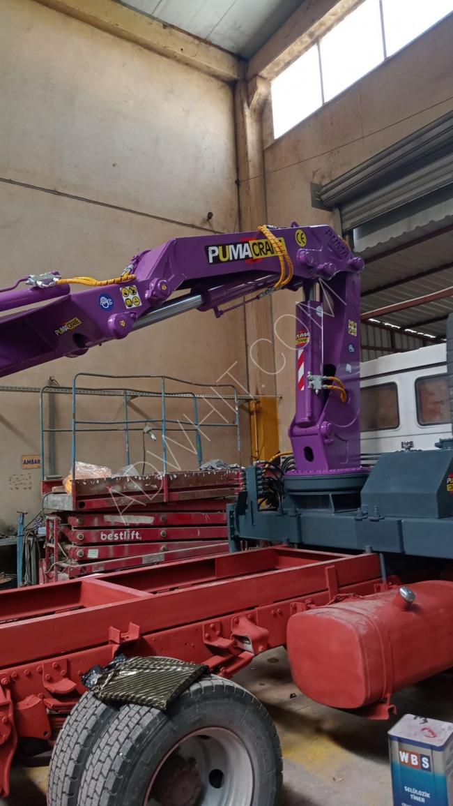 Fully foldable mobile Puma cranes with a weight of 5 tons and which rotate 360 degrees