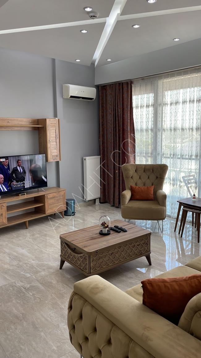A hotel apartment with a living room in the famous Batışehir