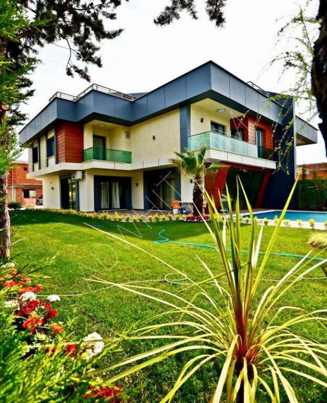 A villa for weekly and monthly rent with a private fenced garden inside a comprehensive complex