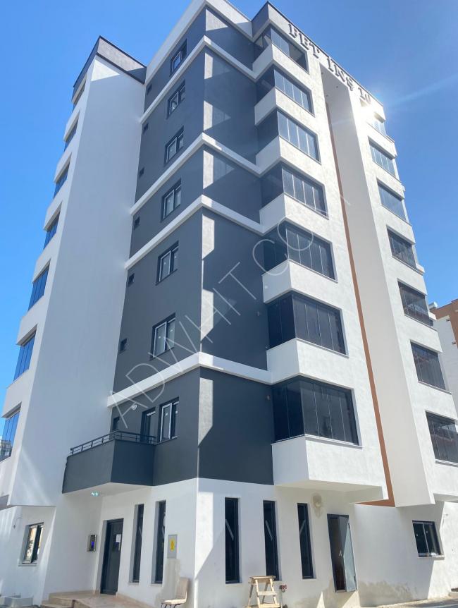 A spacious new 1+1 apartment directly from the owner in the central Mezitli district - achieves high rental return