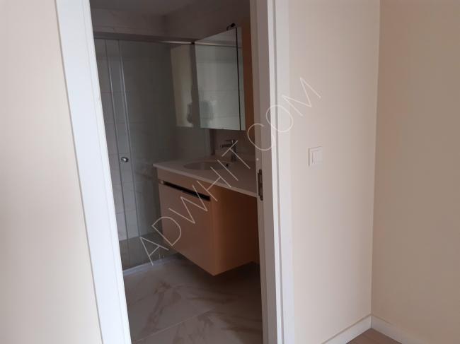 An empty 2+1 apartment with a separate kitchen in the Babacan Premium complex