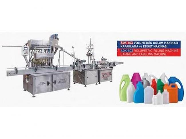 Automatic liquid filling machine for liquid detergents with a capacity of 330-1000 ml